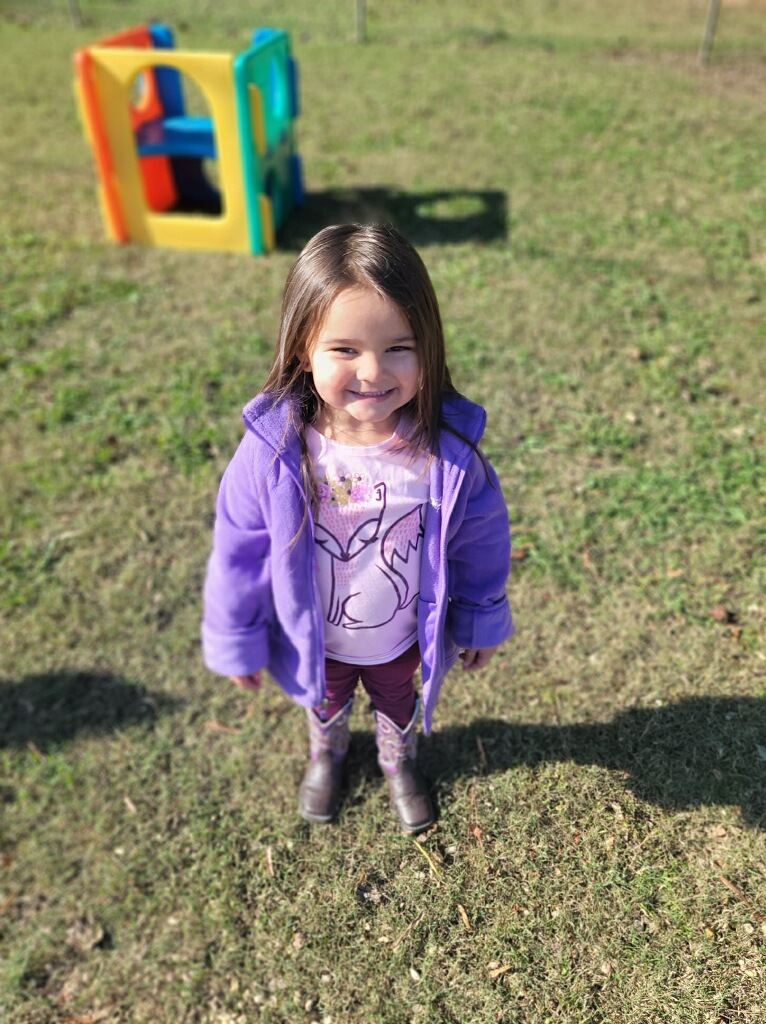 Girl outside at Johnson’s Day Care & Cradle Care in Muscle Shoals, AL