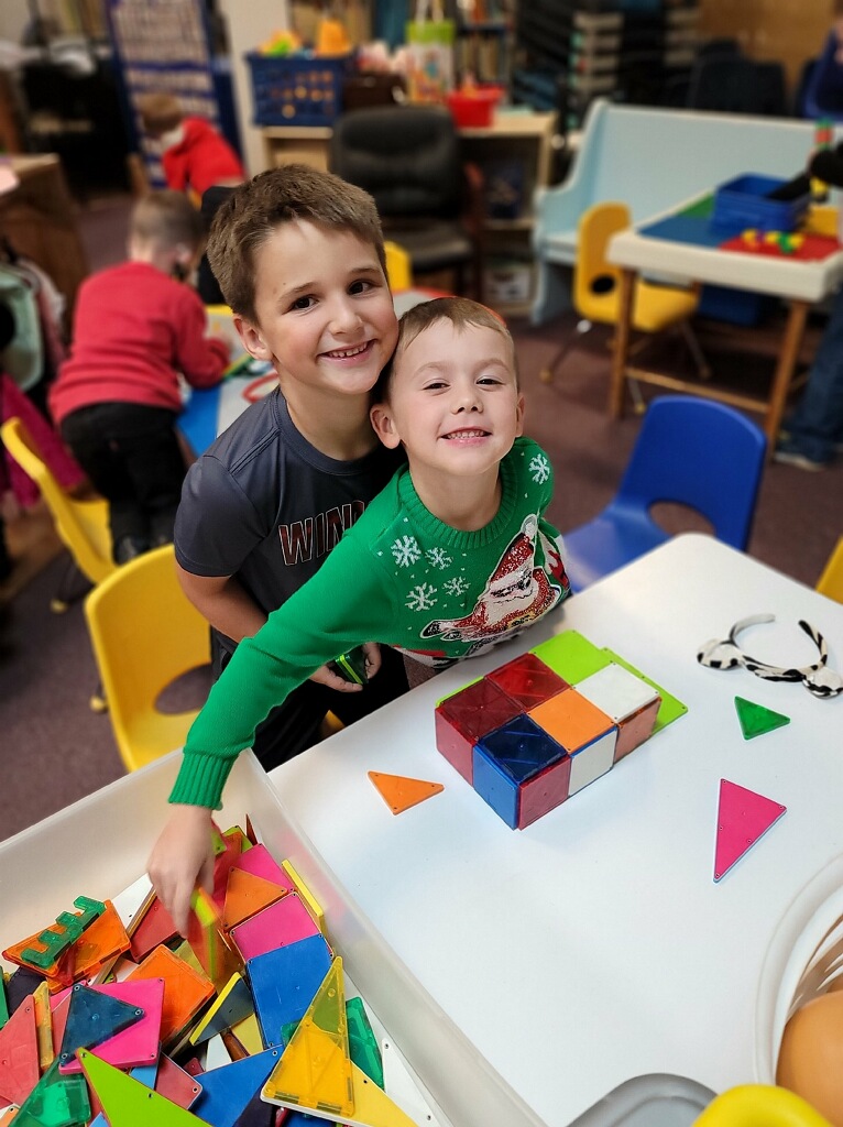 Boys playing with shapes at Johnson’s Day Care & Cradle Care in Muscle Shoals, AL